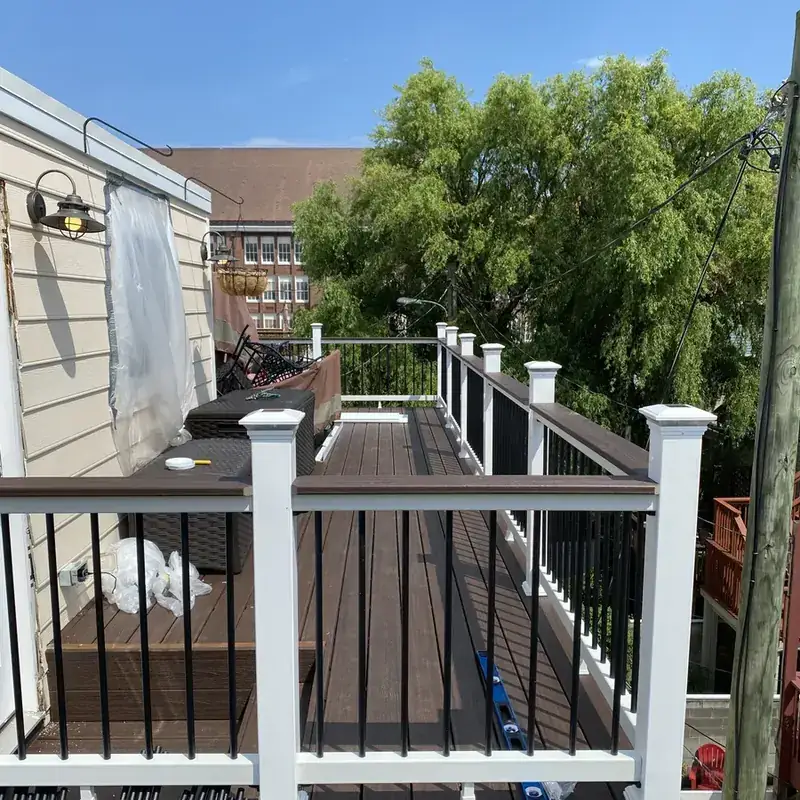 elevated composite deck with black metal railings