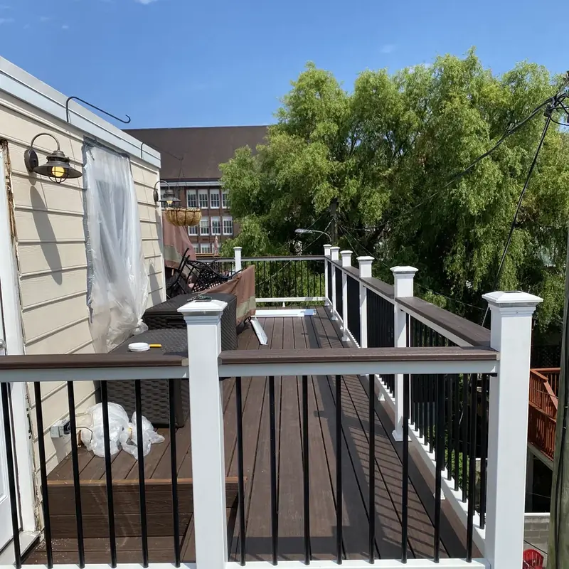 composite deck with black balusters and white posts