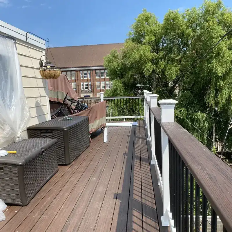 composite deck with storage bench and grill cover