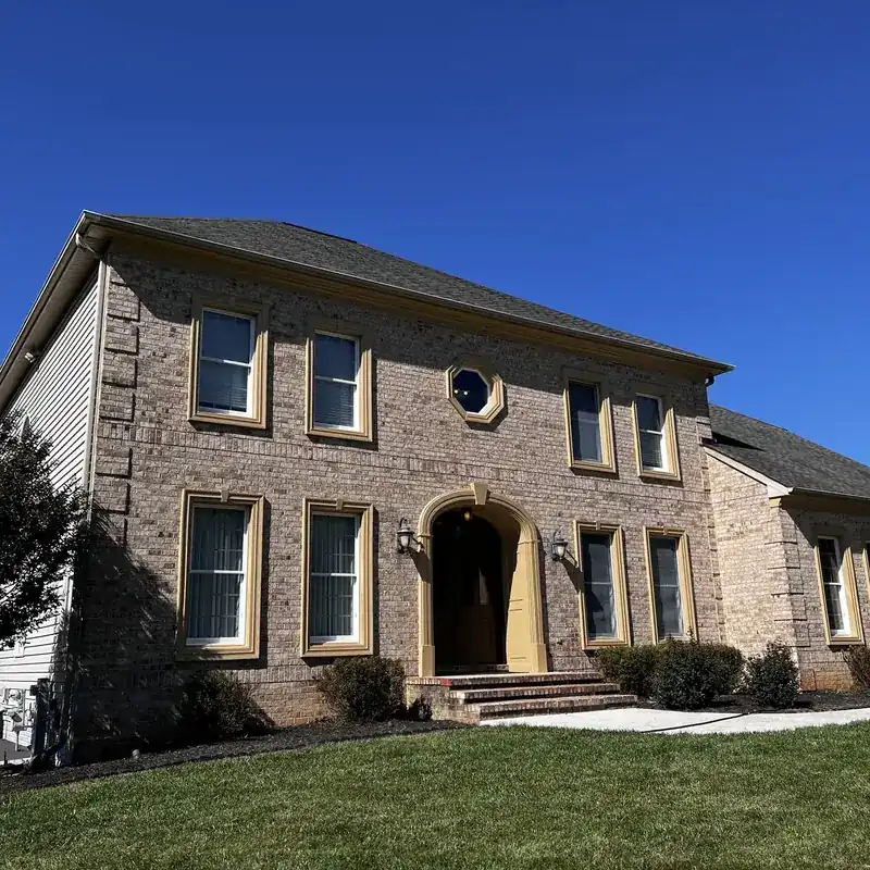 Brick two-story home angled exterior view